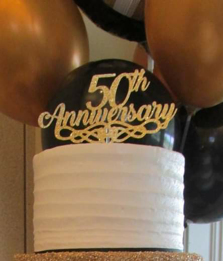 50th birthday balloons and cake